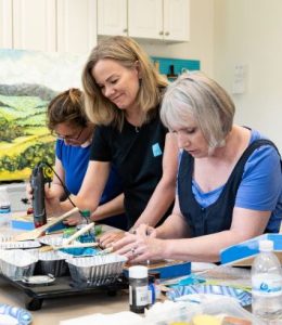 Anne Stine teaches encaustic workshop in her studio