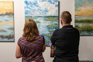 patrons viewing art