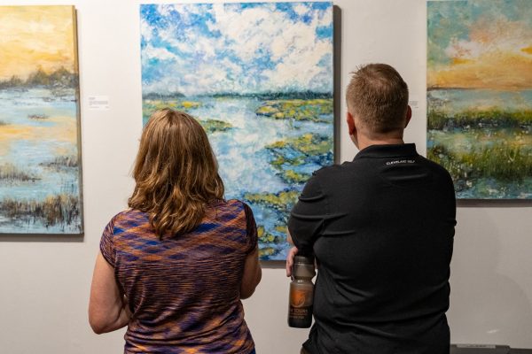 patrons viewing art