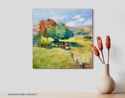 country barn yard painting hanging on wall