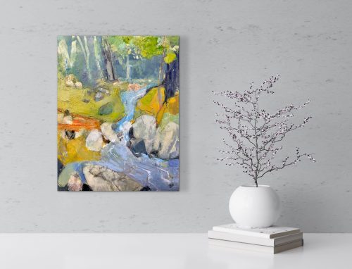 abstract landscape painting hanging on the wall