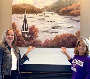 Anne Stine with client and commissioned painting